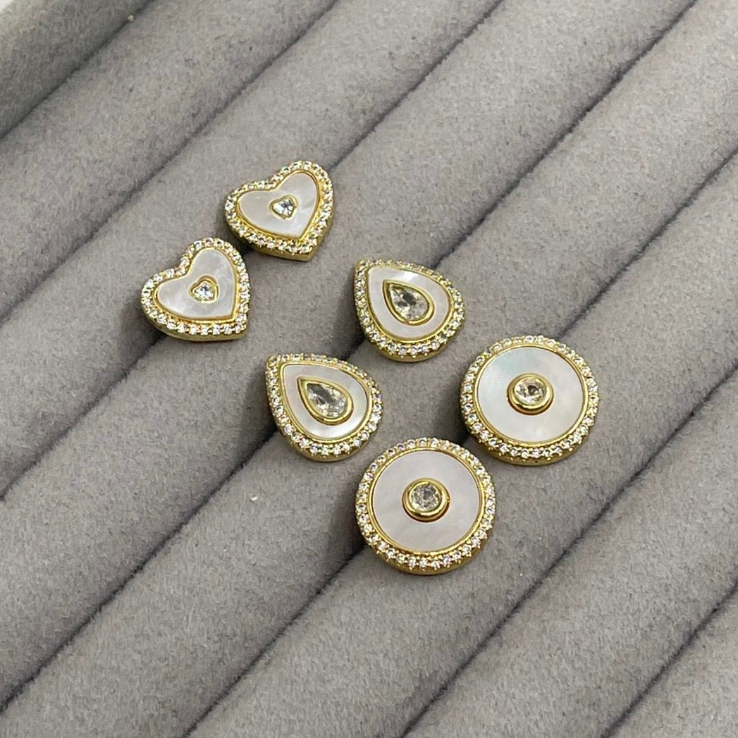 Aretes concha blanca