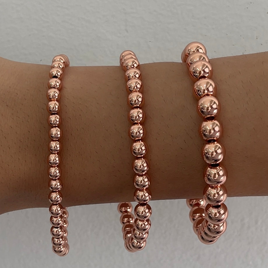 Pulseras bola rosa gold
