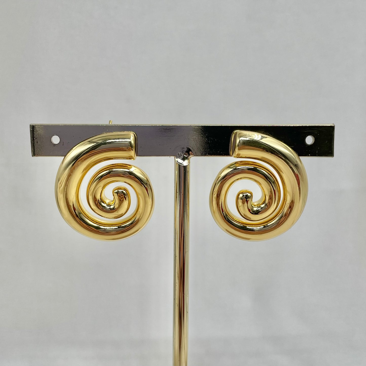 Aretes espiral baño de oro/ acero