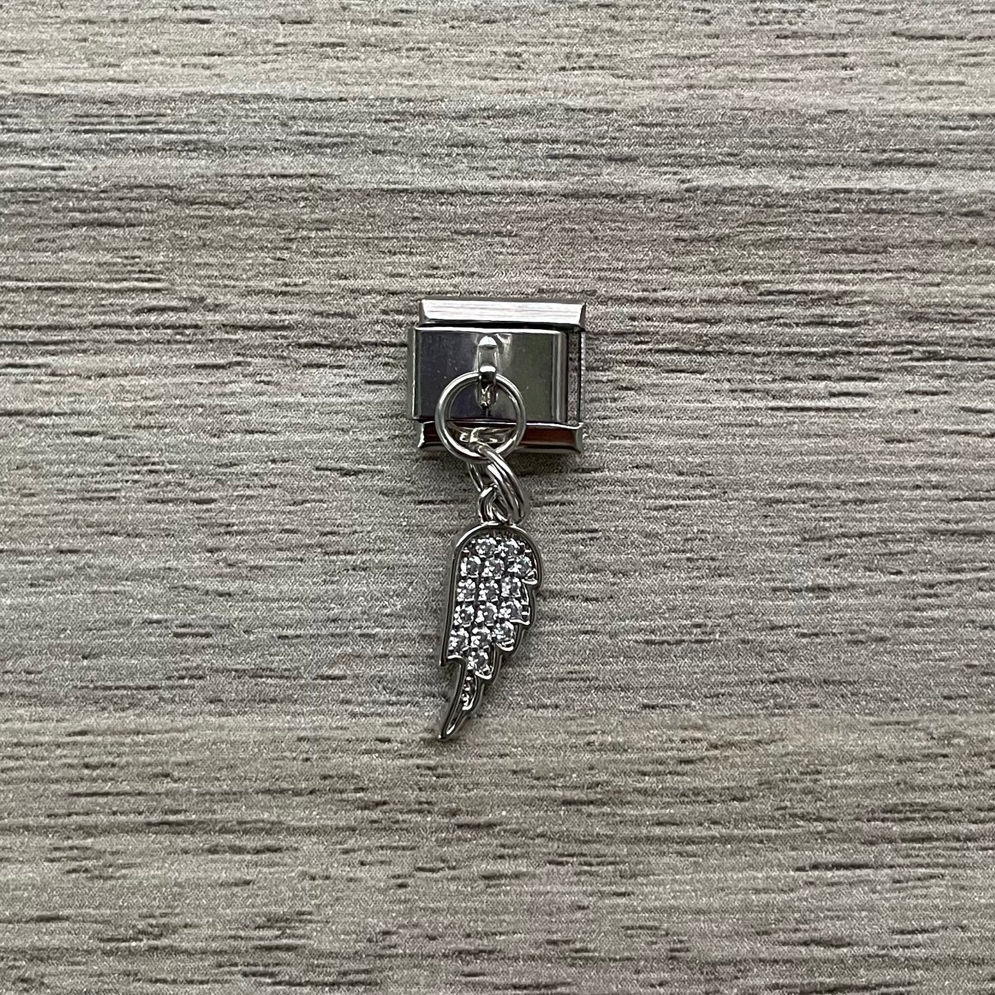 CHARM Ala Colgante 🪽