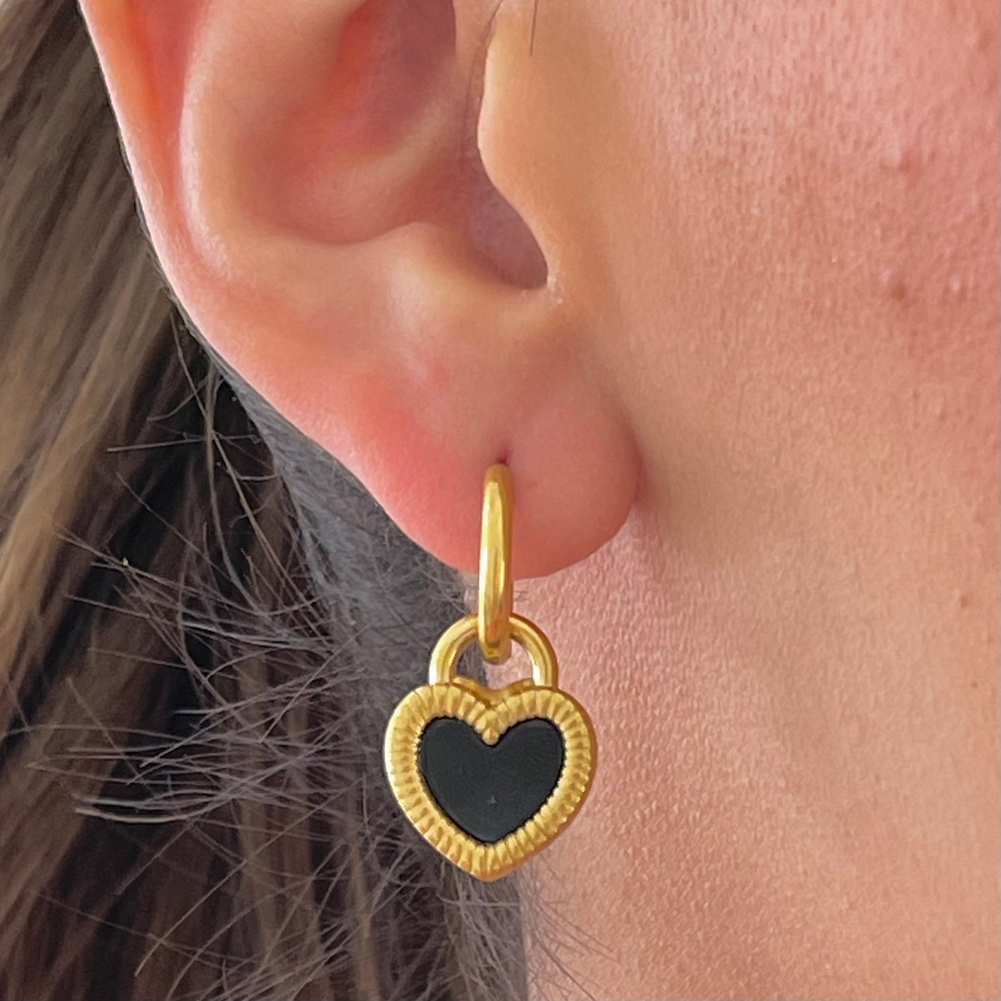 Aretes corazón doble vista acero