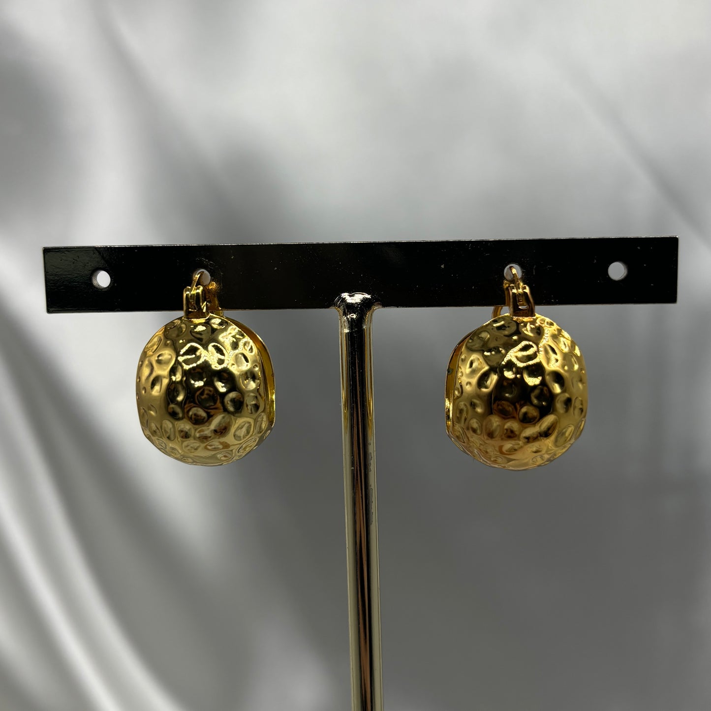 Aretes bolsa textura