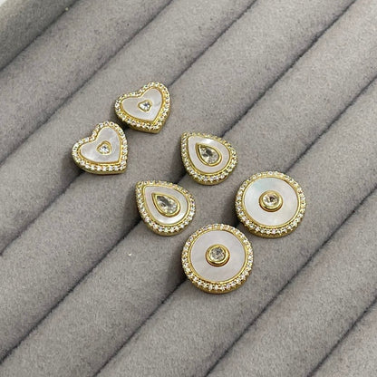 Aretes concha blanca