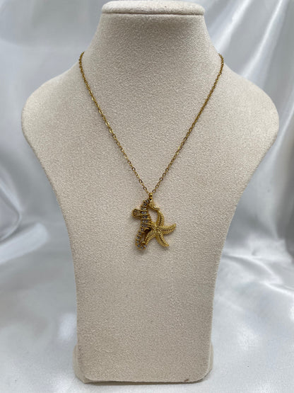 Collar dije Estrella y Caballo Mar