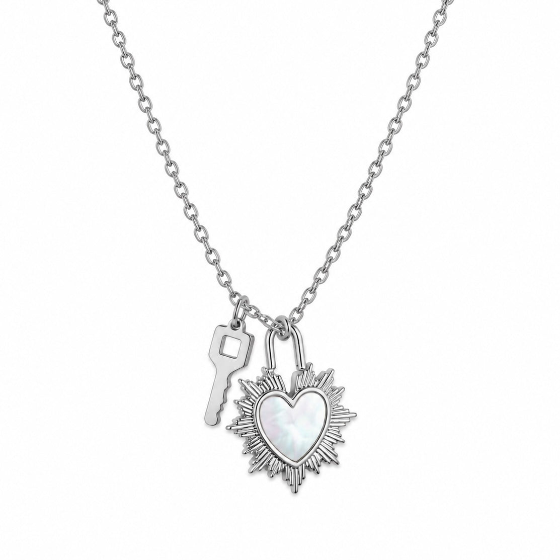 Dije corazón concha y llave