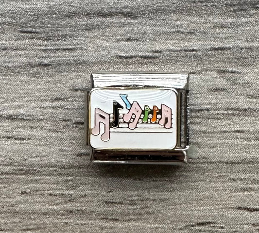 Charm notas musicales