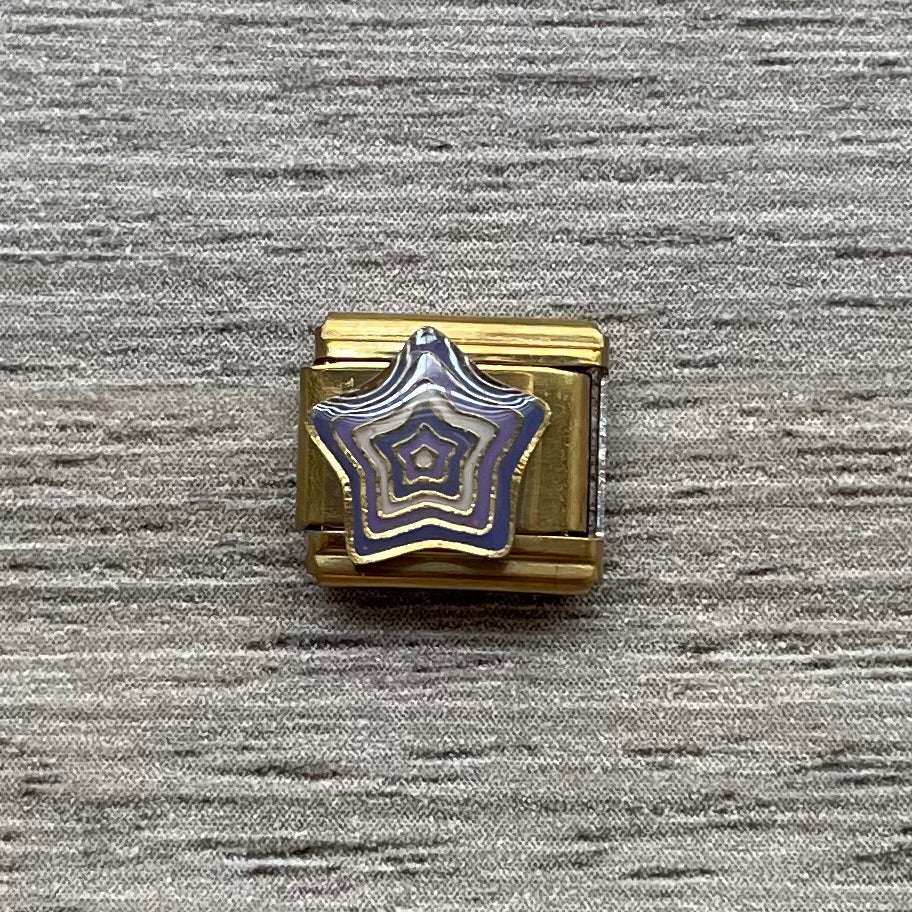 Charm estrella morada