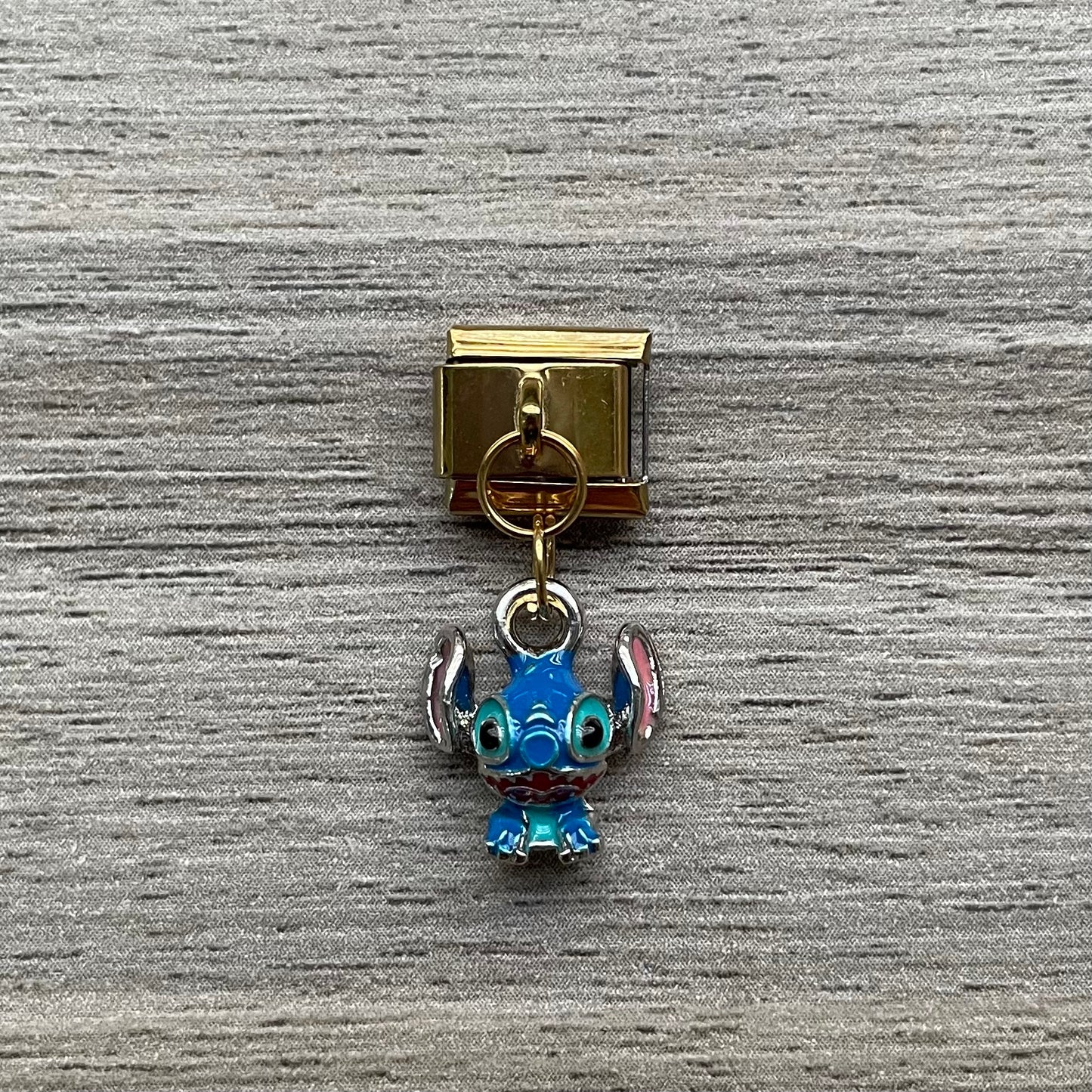 CHARM Stich Colgante