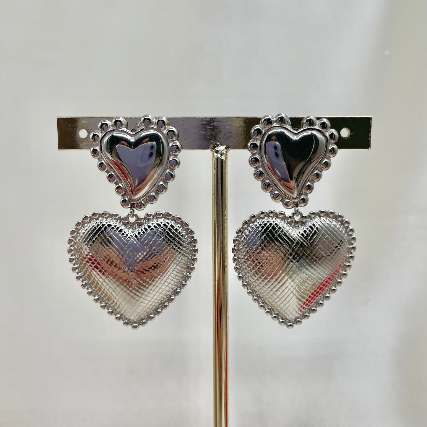 Aretes corazón escudo