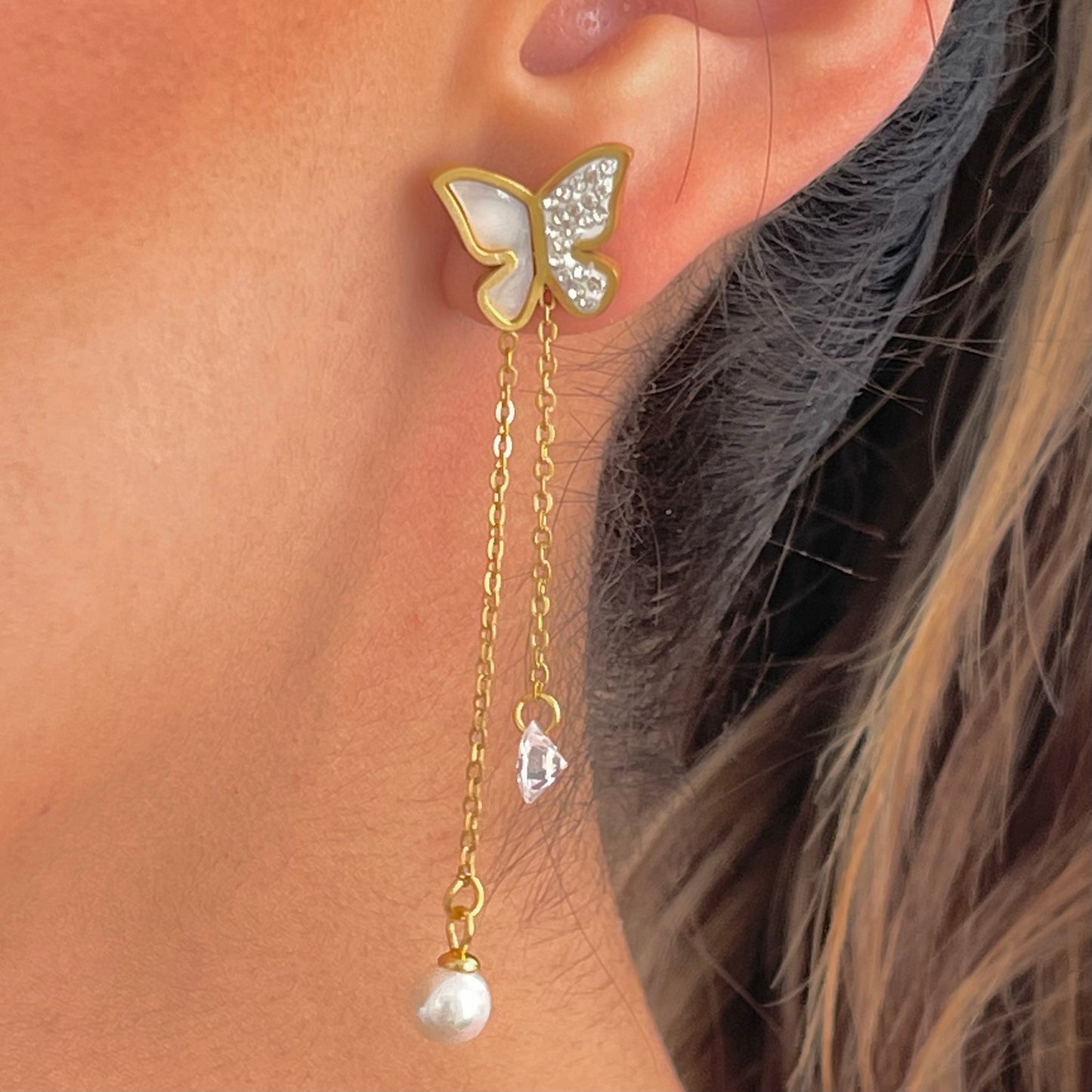 Aretes mariposa diferentes