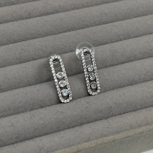 Aretes Messi