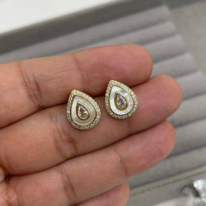 Aretes concha blanca