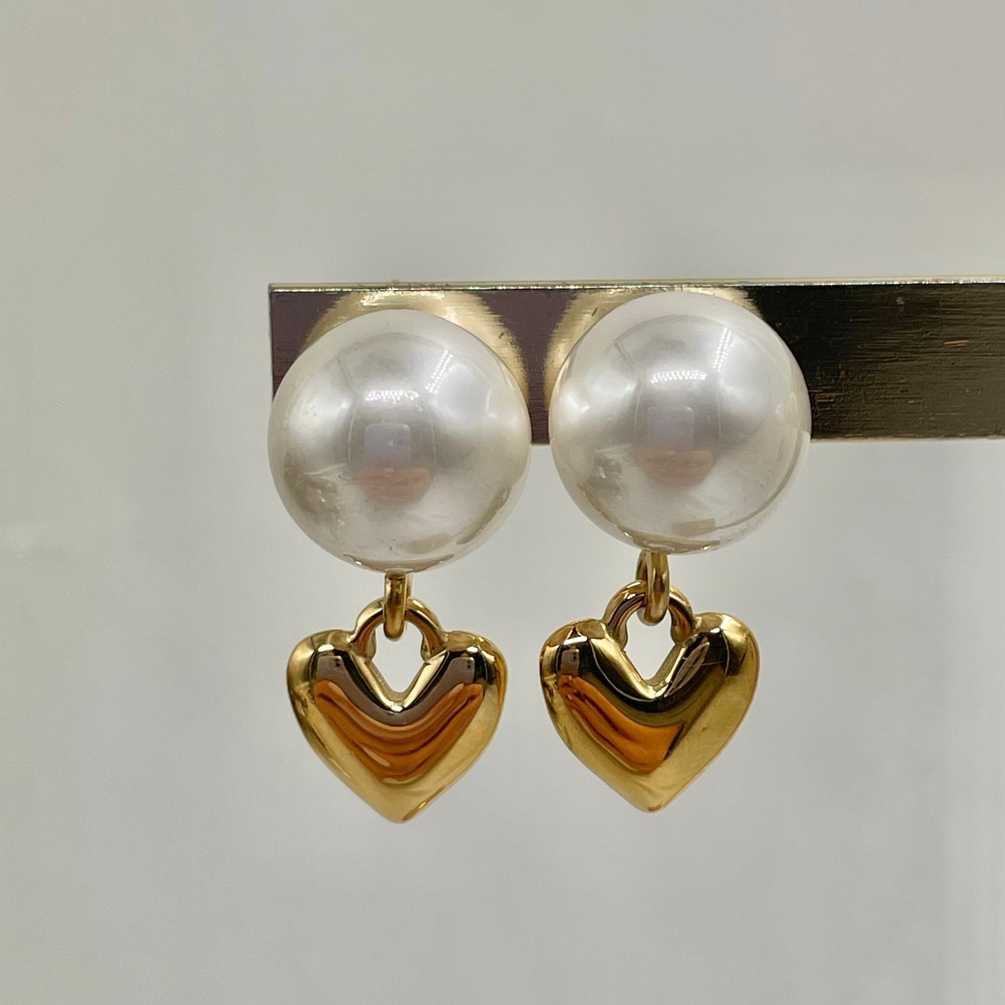 Aretes perla y corazón