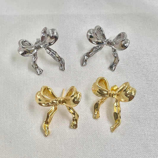 Aretes moño acero