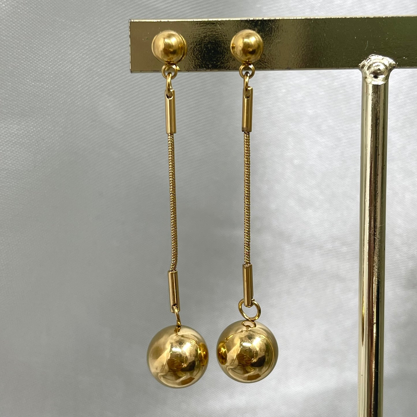 Aretes largos bola
